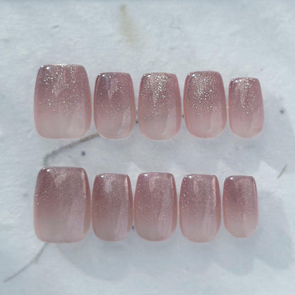 Short square pink mauve ombré press-on nails with fine glitter shimmer, soft blush gradient, and glossy finish